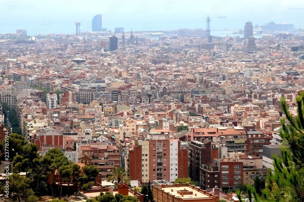 Aerial view of Barcelona, Spain from Park Güell on a sunny day.