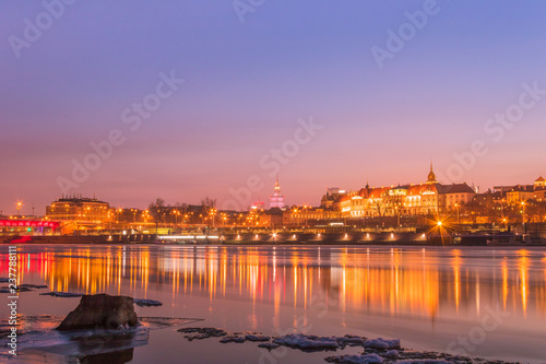 Warsaw skyline with reflection in the Vistula river in the evening