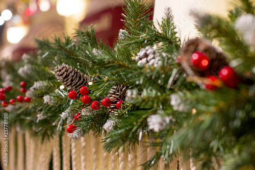 Christmas trees decorated with toys and flowers. Beautiful winter trees.