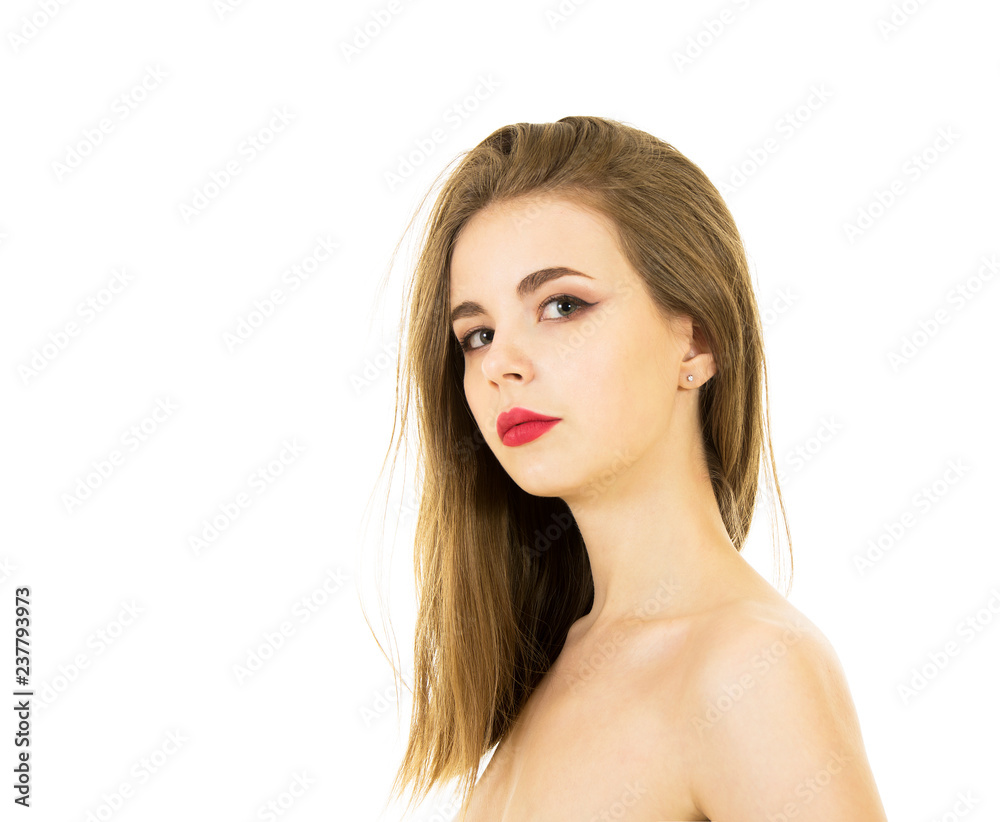 Portrait of a naked young, smiling woman with long hair and makeup. Portrait of a naked young, smiling woman with long hair and makeup.