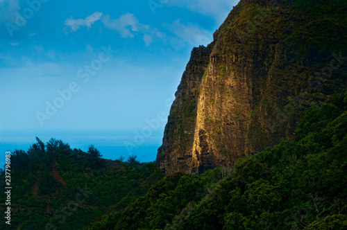 Foreboding stone cliff wall on the island of Kauai, Hawaii, USA
