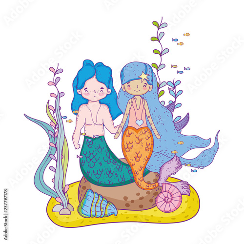 couple mermaids undersea scene