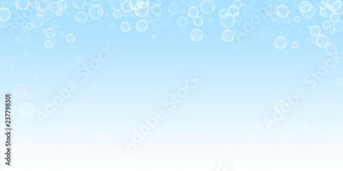 Random soap bubbles abstract background. Blowing b