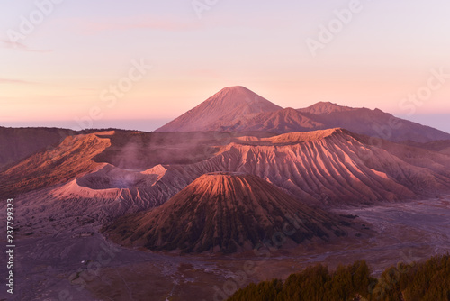 Scenic view of Mount Bromo and Mount Semeru active volcanos at sunrise in East Java Indonesia