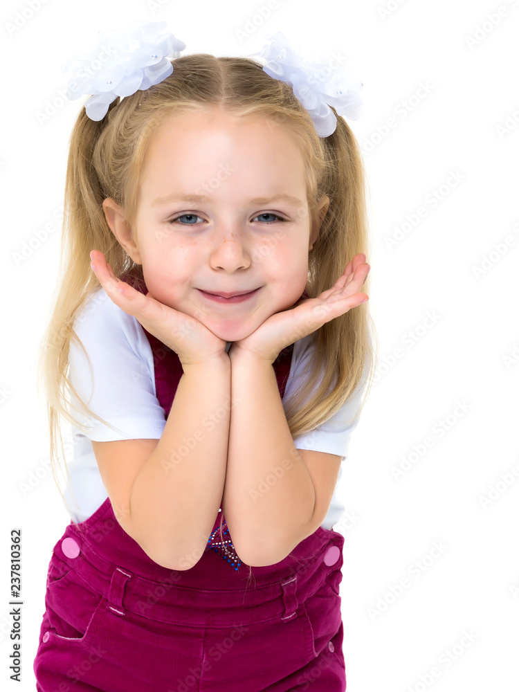 Little girl posing in the studio. Close-up. Little girl posing in the studio. Close-up.