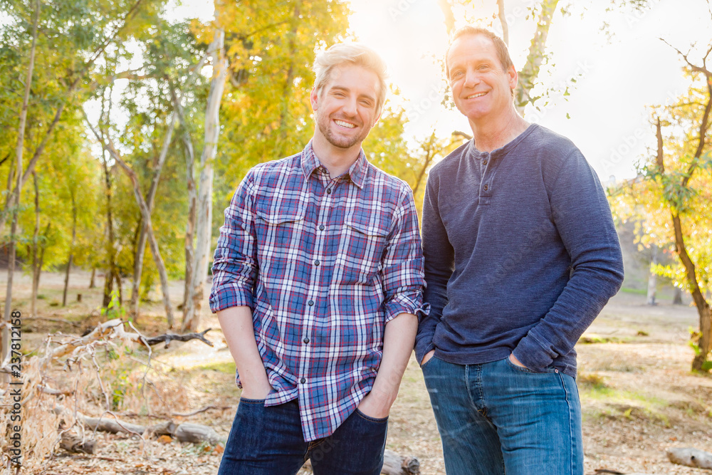 Happy Caucasian Father and Son Portrait Outdoors Happy Caucasian Father and Son Portrait Outdoors