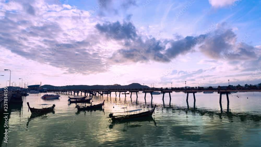 4K TimeLapse Chalong pier during sunrise or sunset,beautiful colorful dramatic sky in Phuket thailand 4K TimeLapse Chalong pier during sunrise or sunset,beautiful colorful dramatic sky in Phuket thailand