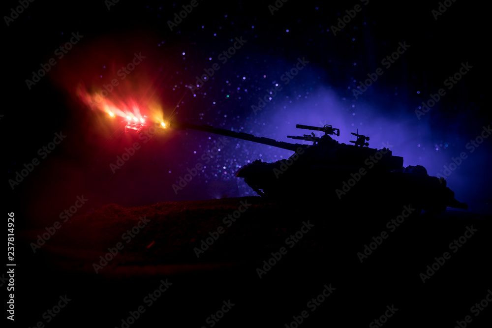 War Concept. Military silhouettes fighting scene on war fog sky background, World War German Tanks Silhouettes Below Cloudy Skyline At night. Attack scene. Armored vehicles. Tanks battle