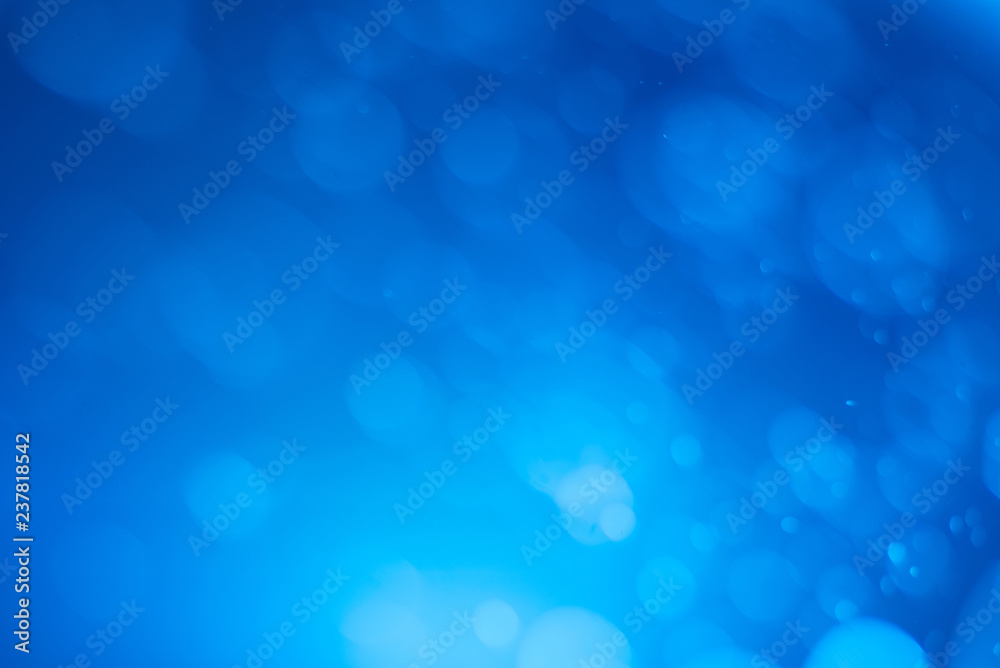 Abstract blue bokeh background.