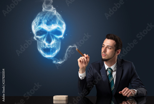 Businessman smoking with skull simbol above his head.