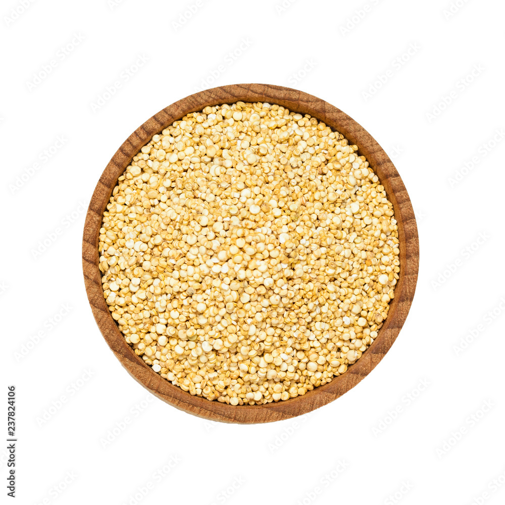 Wooden bowl with quinoa seeds isolated on white background. Wooden bowl with quinoa seeds isolated on white background.