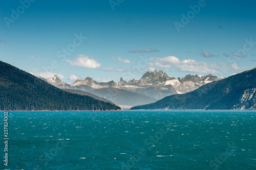 Entrance to teal colored glacial waters of windy Taku Inlet, Juneau, Alaska, USA photo