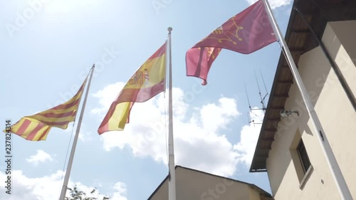 Spanish flag waving through the wind photo