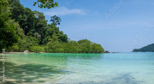 Fototapeta Naklejka Na Ścianę i Meble -  Wonderful blue sea at Andaman sea, Beautiful beach at Surin Island, Thailand 