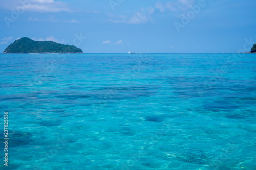 Wonderful blue sea at Andaman sea, Beautiful beach at Surin Island, Thailand  © Teerawut