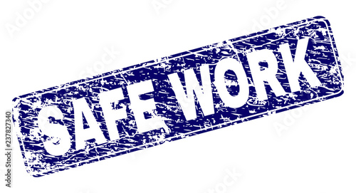 SAFE WORK stamp seal print with distress texture. Seal shape is a rounded rectangle with frame. Blue vector rubber print of SAFE WORK label with unclean texture.