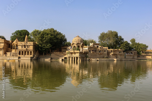 A man-made water reservoir (Gadisar Lake) in Jaisalmer. Constructed by the first ruler of Jaisalmer, Raja Rawal Jaisal, it is surrounded by temples and ghats (banks).
