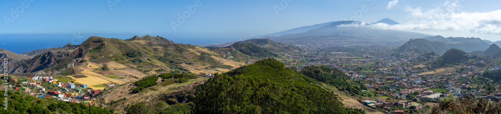Panoramic view of the valley, the old capital of the island of San Cristobal de La Laguna and the volcano Teide. Tenerife. Canary Islands. Spain. View from the observation deck - Mirador De Jardina.