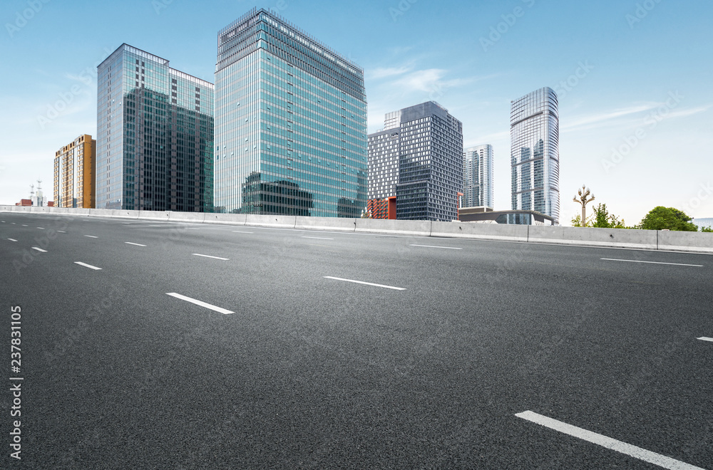 The expressway and the modern city skyline are in chengdu, China. The expressway and the modern city skyline are in chengdu, China.