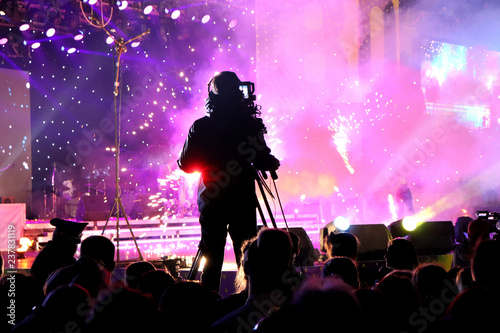 Crowd and cameraman at a concert. Music show