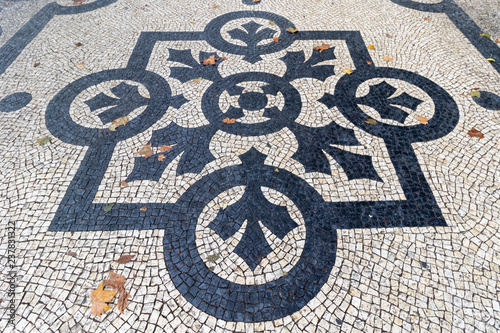 A variety of patterns of paving slabs on the pedestrian zones of Lisbon. Portugal in Autumn