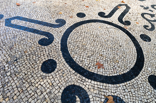 A variety of patterns of paving slabs on the pedestrian zones of Lisbon. Portugal in Autumn