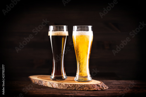 a glass of beer  on wooden background