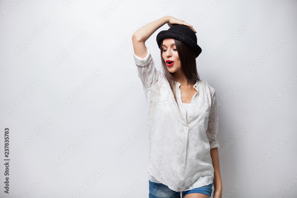 Excited young casual girl having fun. Isolated on white background Excited young casual girl having fun. Isolated on white background