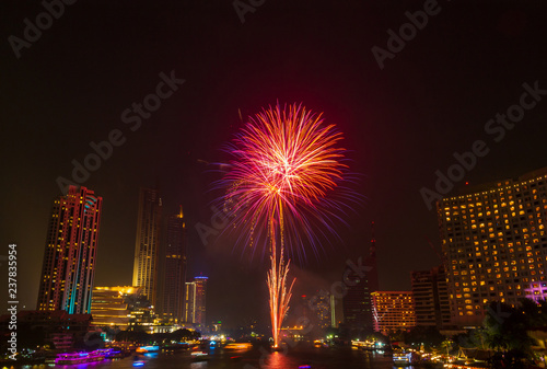 Fireworks at Loy Krathong Festival Chao Phraya River at night Bangkok Thailand