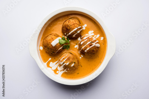 Malai Kofta Curry is a Mughlai special recipe served in a bowl. Selective focus