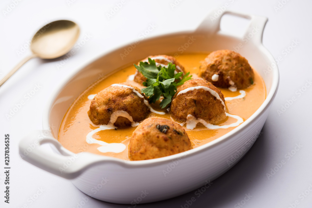 Malai Kofta Curry is a Mughlai special recipe served in a bowl. Selective focus Malai Kofta Curry is a Mughlai special recipe served in a bowl. Selective focus