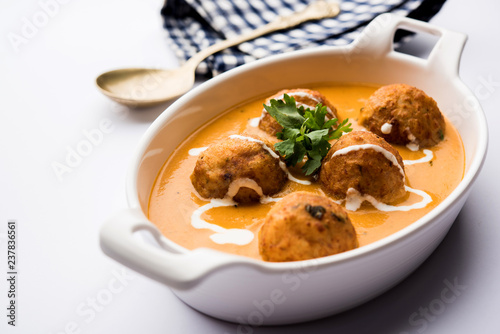 Malai Kofta Curry is a Mughlai special recipe served in a bowl. Selective focus