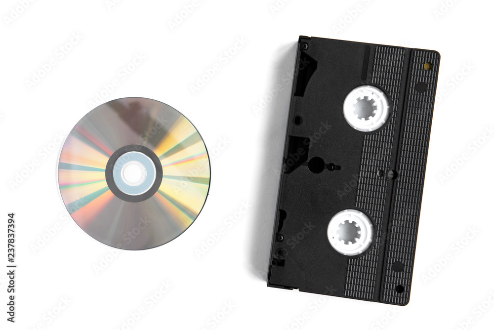 Videocassette and disc isolated on white background. Videocassette and disc isolated on white background.