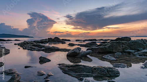 Sunset Over Sea Stone  © Aris Suwanmalee