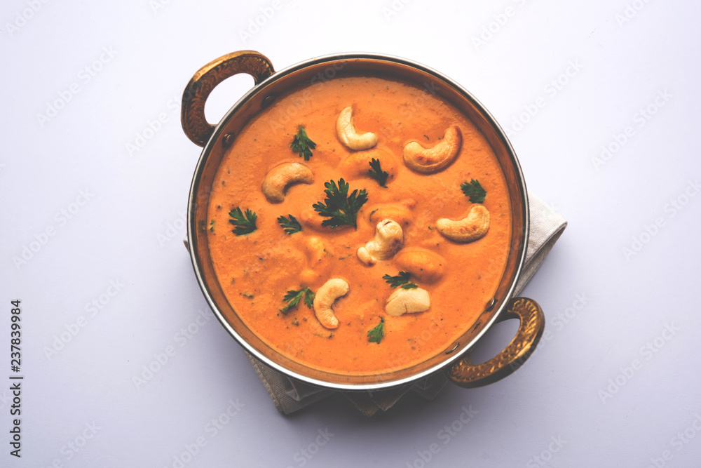Cashew Curry / Indian kaju masala served in a bowl or pan. selective focus Cashew Curry / Indian kaju masala served in a bowl or pan. selective focus