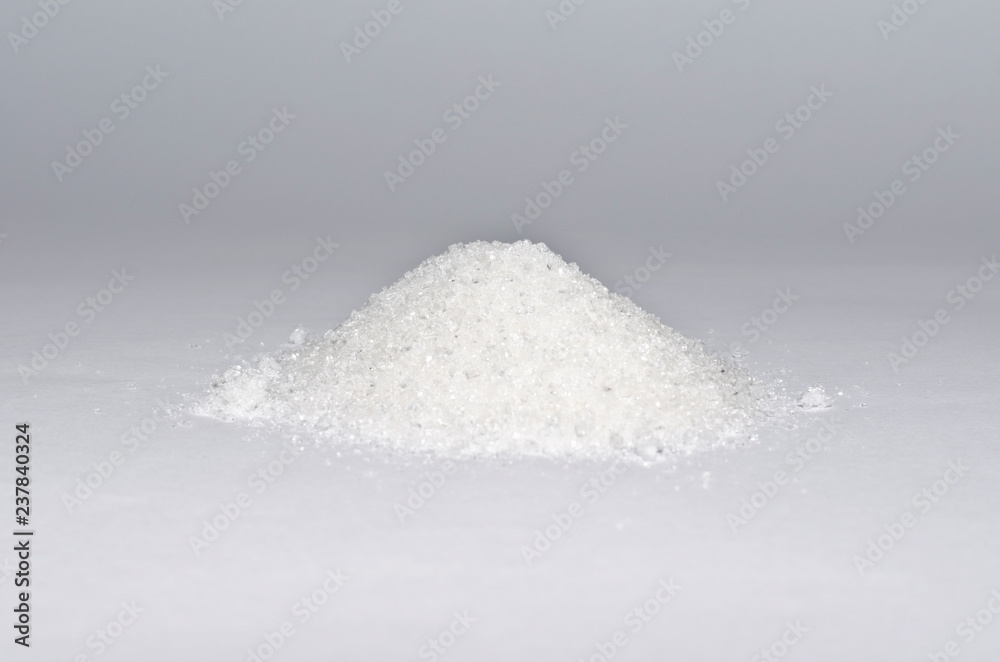 pile of sugar on white background