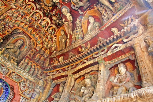 Buddha statues of Yungang Grottoes   The World cultural heritage site  Famous  Buddhist Caves Art Treasure Houses  in Datong  Shanxi Province  China. World heritage site. Selective focus.