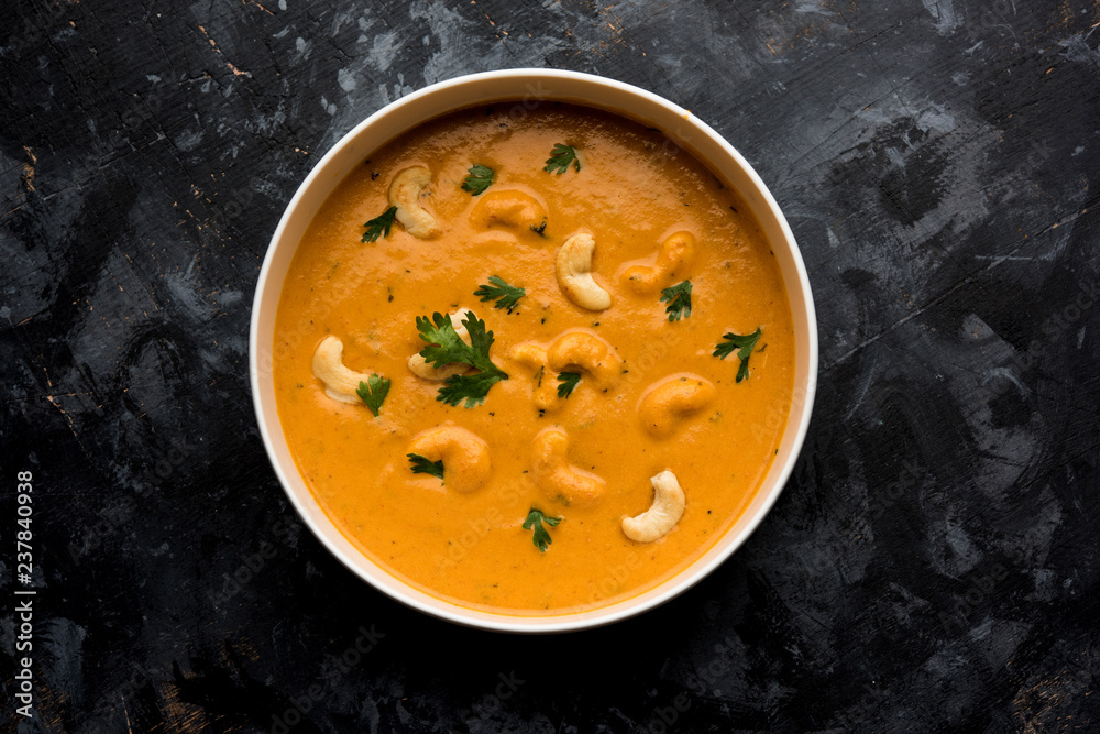 Cashew Curry / Indian kaju masala served in a bowl or pan. selective focus Cashew Curry / Indian kaju masala served in a bowl or pan. selective focus