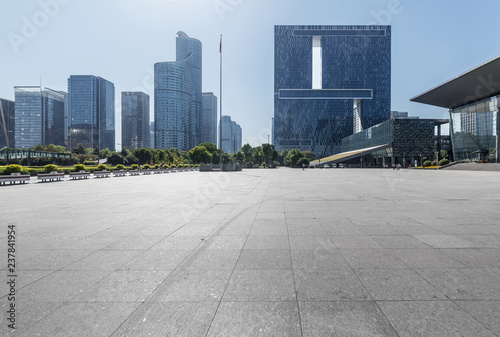 Panoramic skyline and buildings with empty concrete square floor，Qianjiang New Town，hangzhou,china