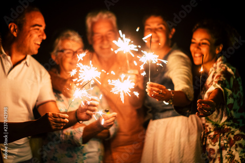 Fotografia, Obraz group of people have fun celebrating together new year eve or birthday with spar