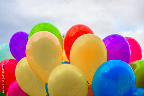 A bunch of colored helium balloons. Balloons for festival and holiday.