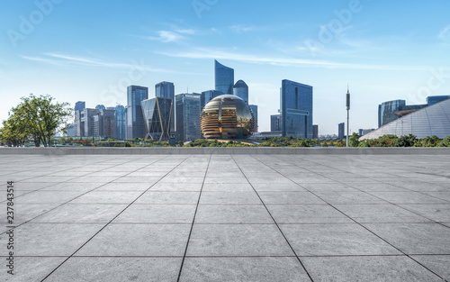 Panoramic skyline and buildings with empty concrete square floor，Qianjiang New Town，hangzhou,china photo