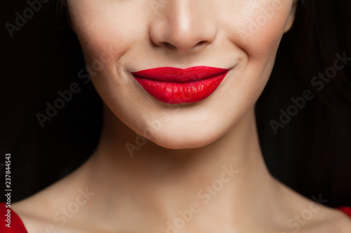 Beautiful female lips closeup. Red lips makeup