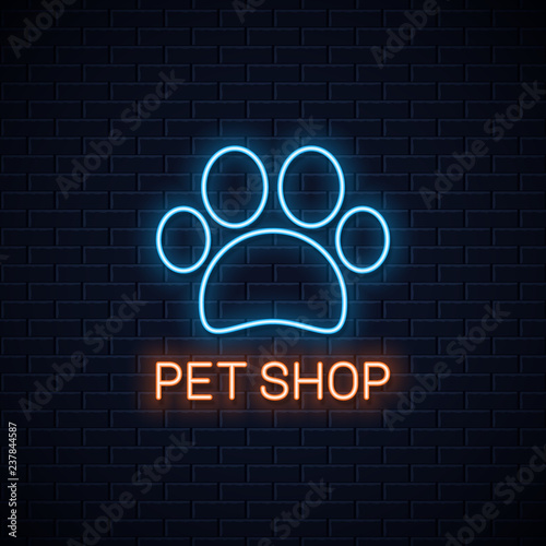 pet shop neon . Neon pet paw on wall background