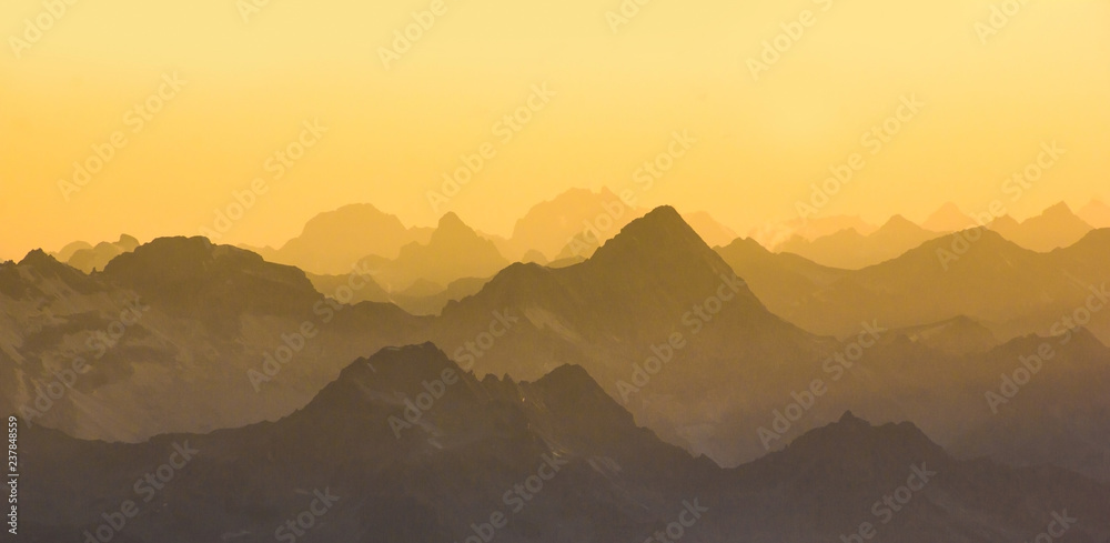 The main Caucasian ridge from mount Elbrus at sunset.