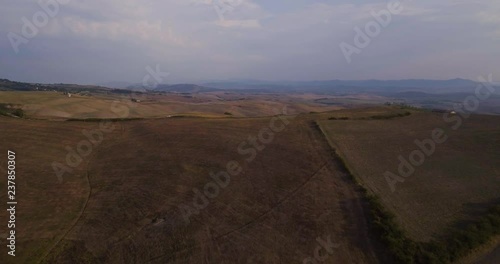 Aerial, gorgeous view on plowed fields landscape in Tuscany photo