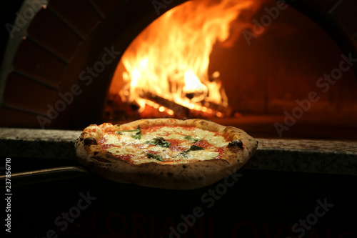 Margherita pizza near the stove