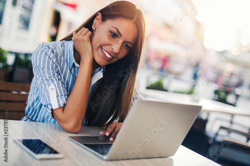 Pretty girl using laptop