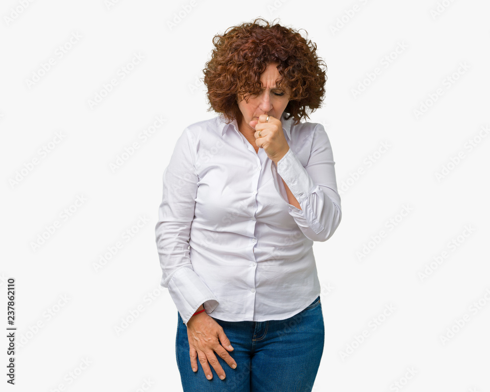 Beautiful middle ager senior businees woman over isolated background feeling unwell and coughing as symptom for cold or bronchitis. Healthcare concept. Beautiful middle ager senior businees woman over isolated background feeling unwell and coughing as symptom for cold or bronchitis. Healthcare concept.