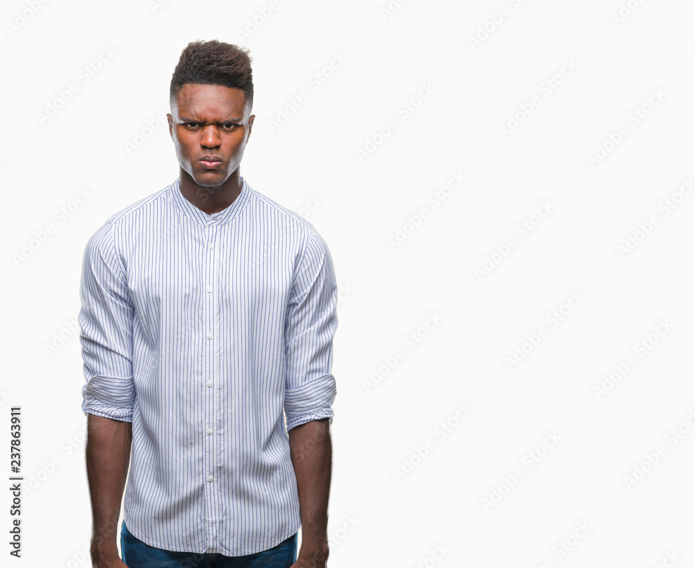 Young african american man over isolated background skeptic and nervous, frowning upset because of problem. Negative person. Young african american man over isolated background skeptic and nervous, frowning upset because of problem. Negative person.